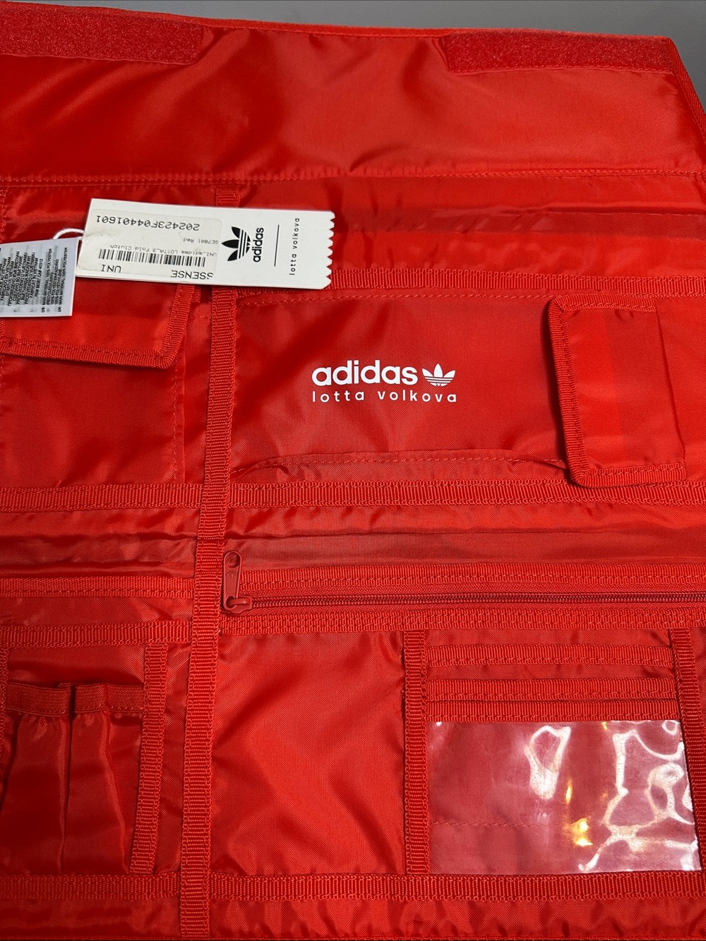 Adidas Originals x Lotta Volkova
3 Fold Red Clutch NWT - Picture 4 of 6